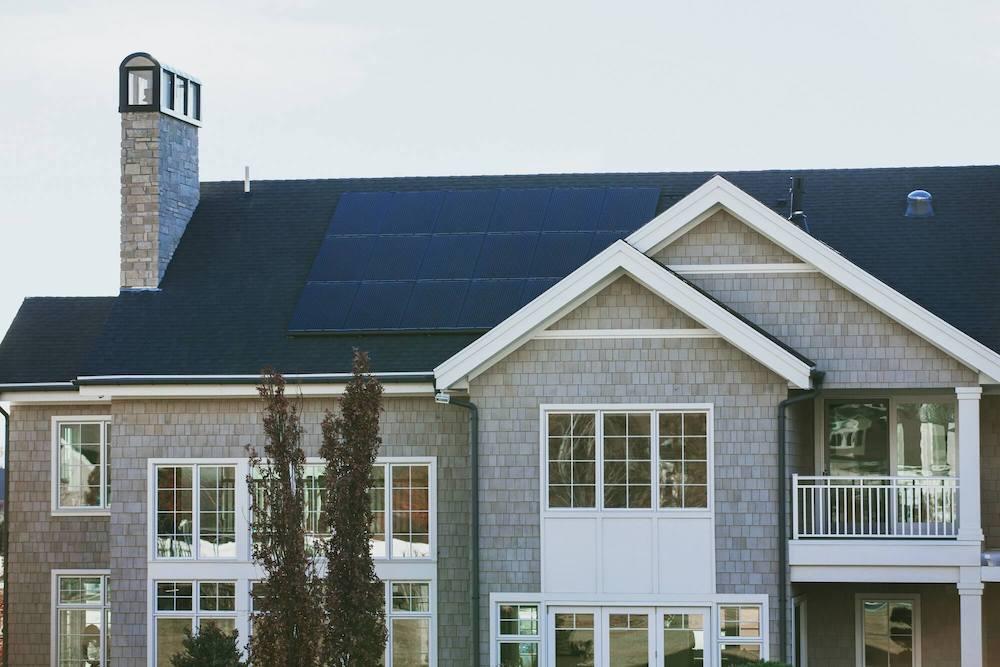 A home with solar panels on the roof.
